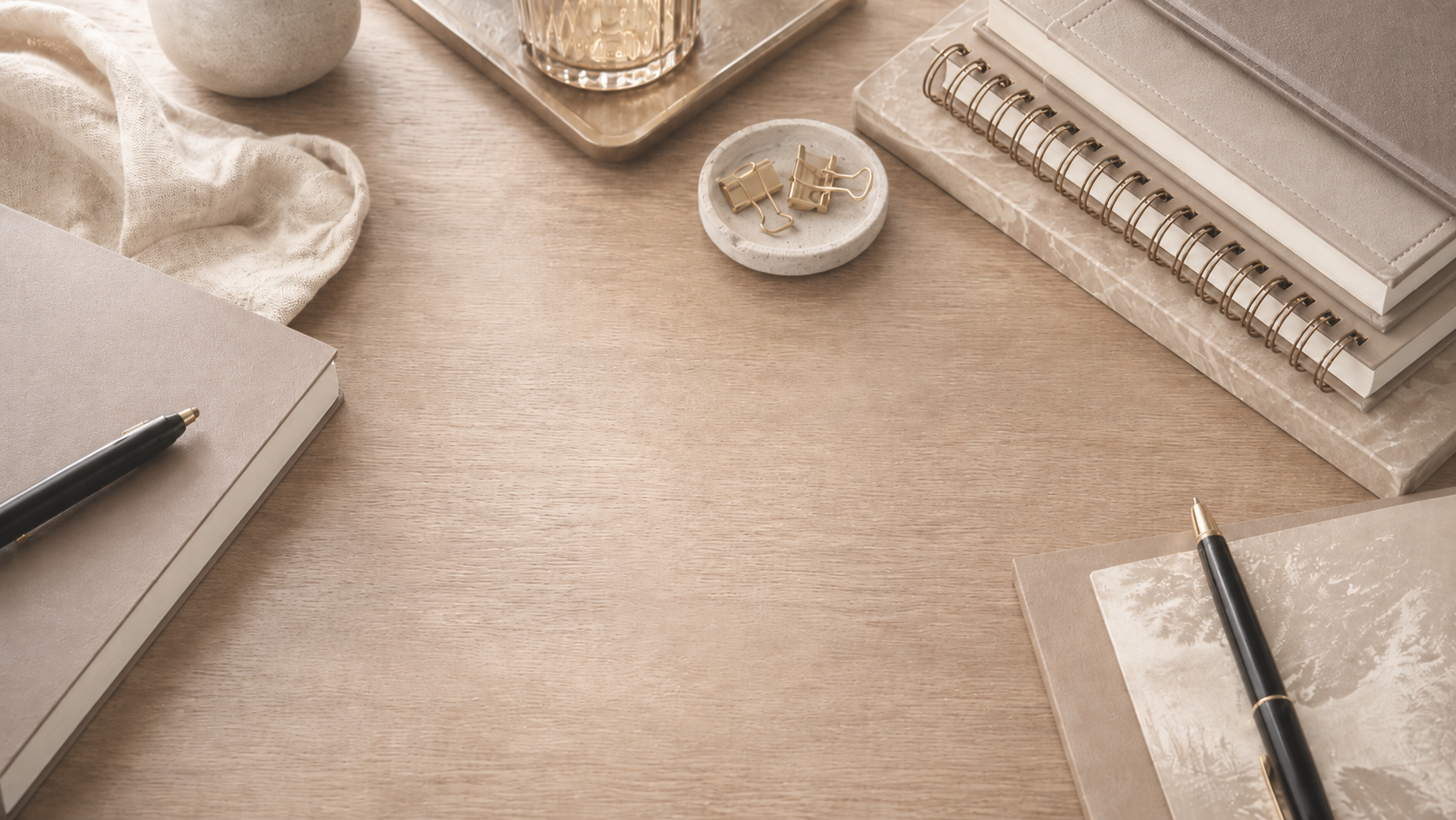 Soft neutral WordArt stationery desk arrangement